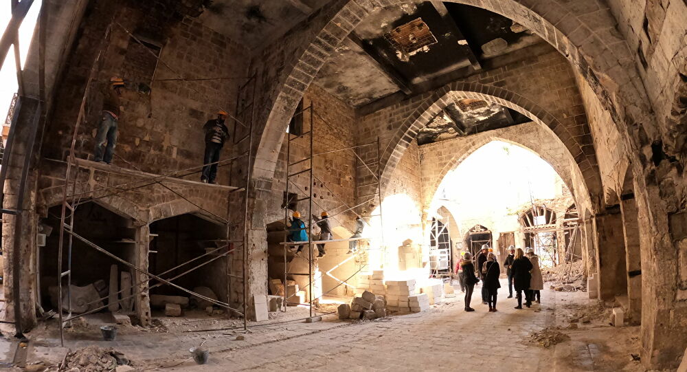 حلب... إعادة سوق مدمر إلى ما كان عليه قبل مئات السنين... صور وفيديو