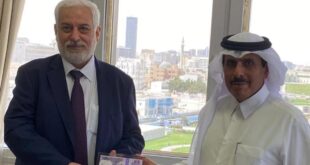 خطاط سوري يضع بصمته على عملة قطرية خاصة بكأس العالم